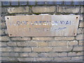 Plaque on the Flood Defence Wall