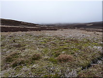 NJ3521 : Typical moorland and typical weather on the N.E. flank of Allt Sowan Hill by Peter Aikman