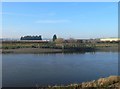 Looking across the Dee towards a ruined jetty