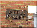 Sign for Cooper Road, NW10