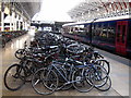 TQ2681 : Cycle racks on the platform at Paddington Station by Rod Allday