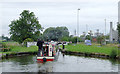 Narrowboat entering Lock No 68 near Middlewich, Cheshire