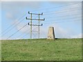 Power lines past the trig point