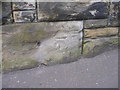 Benchmark on the railway bridge on Birkby Lane