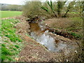 Malpas Brook flows away from a footbridge, Bettws, Newport