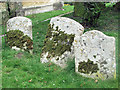 SP9019 : Gravestones by the South Porch, St Mary the Virgin, Mentmore by Chris Reynolds