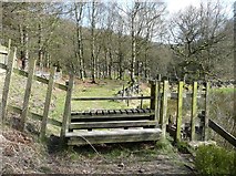 SD9922 : A wide stile near Round Hill Wood, Cragg Vale by Humphrey Bolton