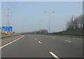 Power lines cross the M58