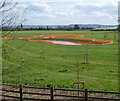 Fenced-off pond in the NW corner of Plock Court Playing Field, Gloucester