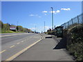 NZ2163 : Walking east along the A695 by Ian S