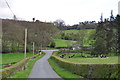 Downhill on the Heath House Lane towards Hollington Road and Lodge for Heath House