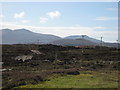 NF8043 : Lochcarnan Windfarm Road by Rupert Fleetingly
