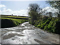 Wet road junction, near Baccamore Pits