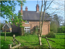 SO8758 : Cottages at Hindlip Park by Trevor Rickard
