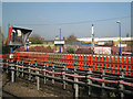 TQ1185 : Red fences and mirror, South Ruislip station by Robin Stott