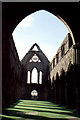 NX9666 : Sweetheart Abbey: looking west along the nave by Christopher Hilton