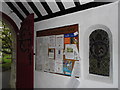 St John the Evangelist, Hale: notice board in the porch