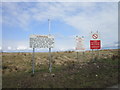 NY6369 : Warning signs near Wobiegill Sike by Ian S