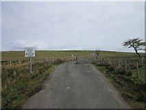 NY6671 : A private by-pass and cattle grid by Ian S