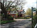 Pair of "Mock Tudor" cottages at Black Brook bridge