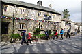 Walkers passing the Buck Inn