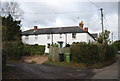 TQ6831 : Weatherboarded cottage, Three Leg Cross by N Chadwick