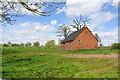 Red Brick semi derelict Barn off Riggs Lane