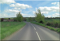SU0168 : Un-named road approaches Blackland Crossroads by Stuart Logan