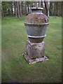 A decorative urn on the lawn