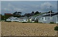 Chalets on the beach and houses higher up