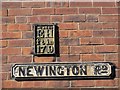 Hydrant plate on house gable