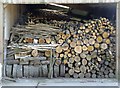 Stack of logs at Follies Farm, Tugley