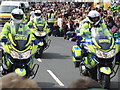 The police escort ahead of the Olympic Torch procession