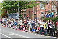 Awaiting the arrival of the Olympic Torch outside King Charles School in Western Terrace Falmouth