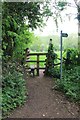 Stile and signpost off Mill Lane