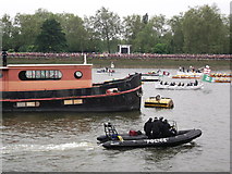 TQ2777 : Police Boat, Barge and rowers, Chelsea Reach by David Anstiss