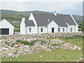 Newly-built traditional style cottage alongside the A2