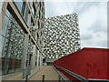 View from Millennium Square towards a futuristic looking car park