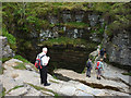 SD7572 : Close to the edge at Gaping Gill by Karl and Ali