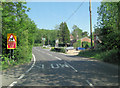 A262 passes The Green Cross Inn