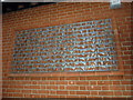 Decorative bricks on the side of Wimbledon Library