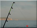 SZ1891 : Mudeford: fishing rod on the quay by Chris Downer