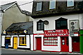 R3377 : Ennis - Market Street - Flower Shop & Barber Shop by Joseph Mischyshyn