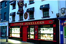 R3377 : Ennis - O'Connell Street - Collins Jewellers - Evening by Joseph Mischyshyn