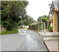 Old Abergavenny Road passes churchyard and pub, Mamhilad