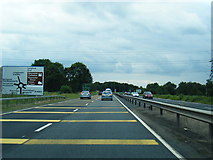 SO8620 : A40 nears Elm Bridge Court roundabout by Colin Pyle