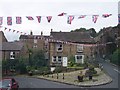 Festive bunting in the square at Dobcross