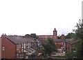 Regent Mill looms above terrace housing at Failsworth