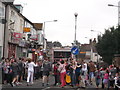 Olympic Torch Runner and crowds on Canterbury Street, Gillingham