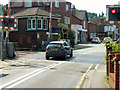 Crossing on the red lights, Farncombe level crossing